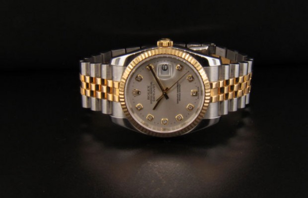 Silver Dial with Gold Dial Hour Markers and Gold Stick Hands