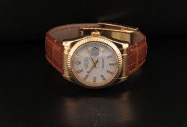 White Dial with Gold Lum Stick Hour Markers and Gold Lum Stick Hands