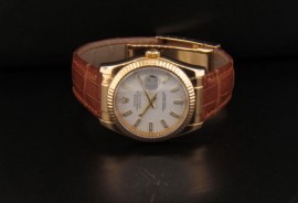 White Dial with Gold Lum Stick Hour Markers and Gold Lum Stick Hands